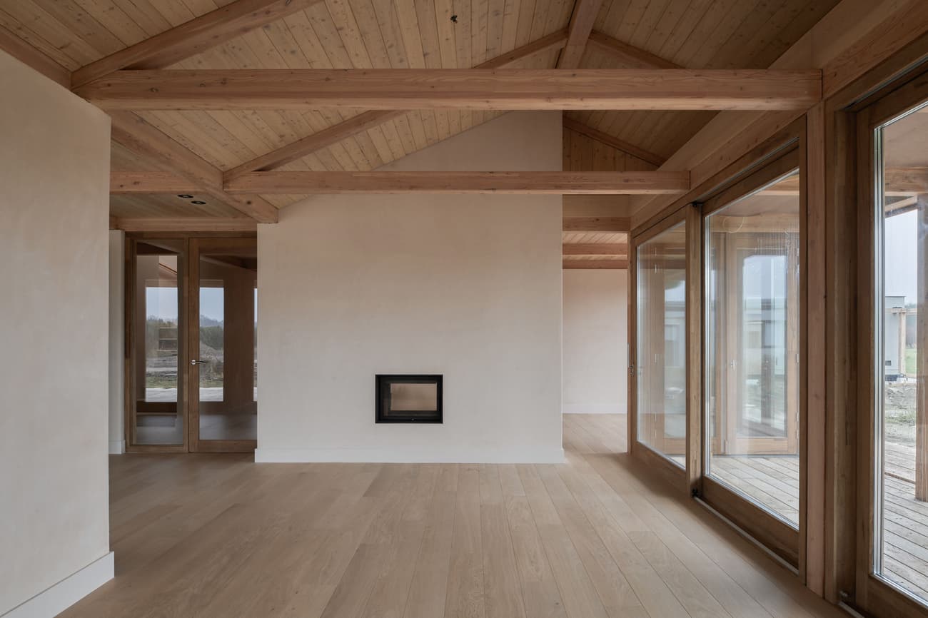 Architectural project - contemporary cabin, airy interior, minimal style, restful space, calm environment, timber home, simple interior, wood, timber, natural light, glass, warm tones, eco design, neutral tones, exposed beams, daylight, beige, brown, light wood, eco friendly, honey wood, wood beams, private retreat, serene atmosphere, Scandinavian style, timber floor, neutral palette, minimalist design, glass doors, wood floor, biophilic design, sustainable home, passive house, clean lines, large windows, indoor outdoor, architectural simplicity, Nordic design, cozy vibe, energy efficient, plaster, timber ceiling, wood cabin, open layout, open plan, inviting space, wood texture, nature-inspired, textured walls, wooden retreat, bright space, sliding doors, plaster walls, floor to ceiling, modern cabin, indoor outdoor flow, modern retreat