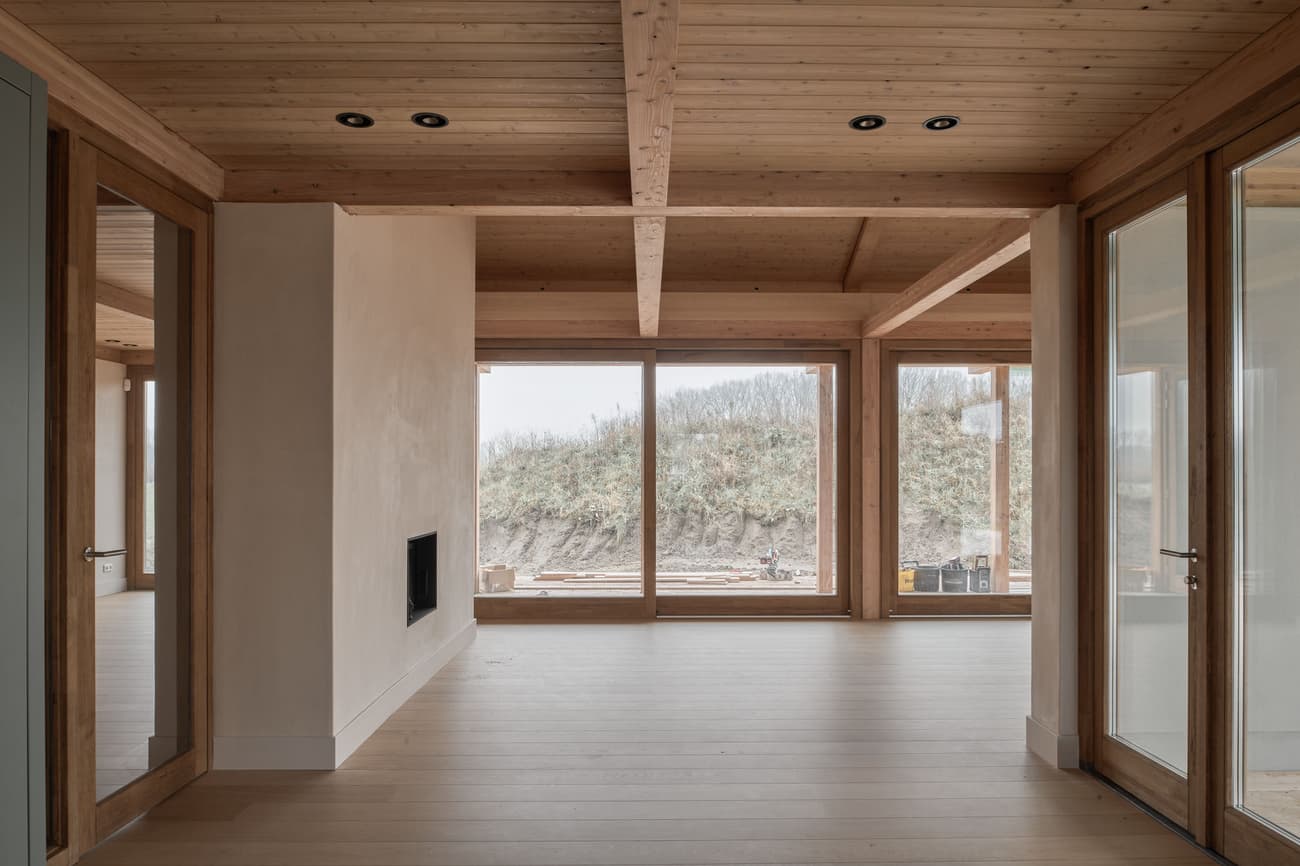Architectural project - wooden doors, calm environment, indoor-outdoor living, refined elegance, minimal design, natural materials, natural light, sustainable design, warm tones, neutral tones, exposed beams, daylight, wooden ceiling, beige, brown, light wood, wooden beams, honey wood, natural textures, rustic charm, serene atmosphere, minimalist style, timber floor, neutral palette, glass doors, timber walls, wood floor, modern rustic, biophilic design, passive house, contemporary home, architectural simplicity, eco friendly home, cozy vibe, Nordic style, energy efficient, wood walls, timber ceiling, timber interior, inviting space, earthy tones, Scandinavian design, comfortable living, open space, simple lines, wood interior